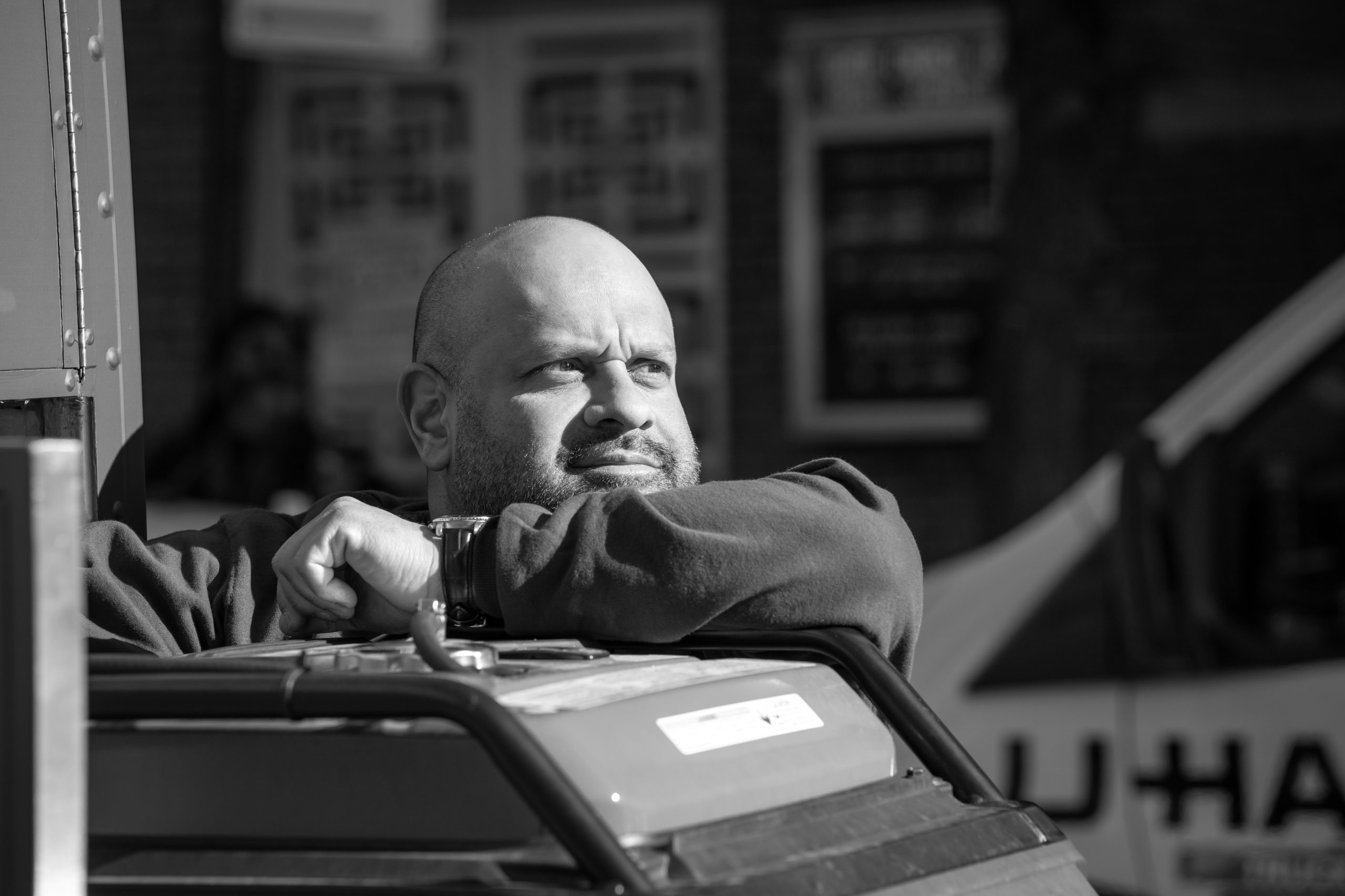Hanssel leaning on generator at branded food truck promotion for Netflix